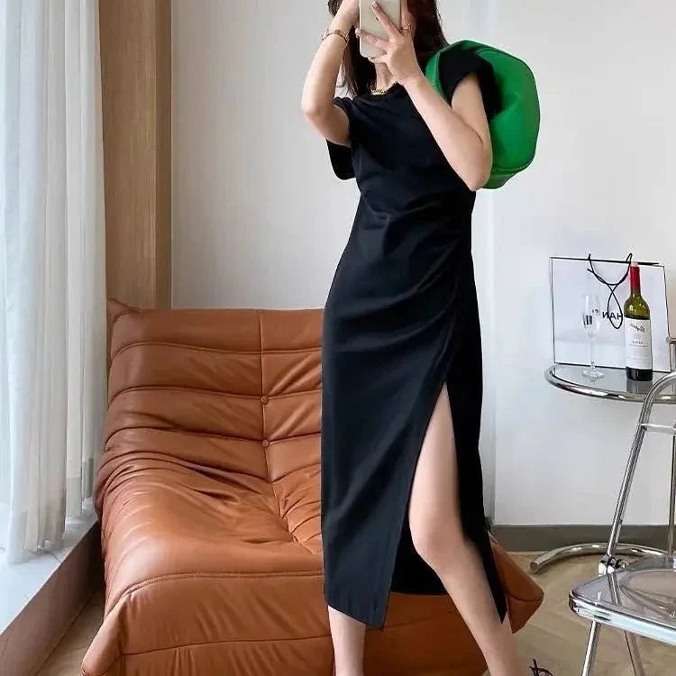 Y2K asymmetrical hem midi dress by The Glow Sanctuary, featuring a stylish streetwear look with a modern, edgy design.