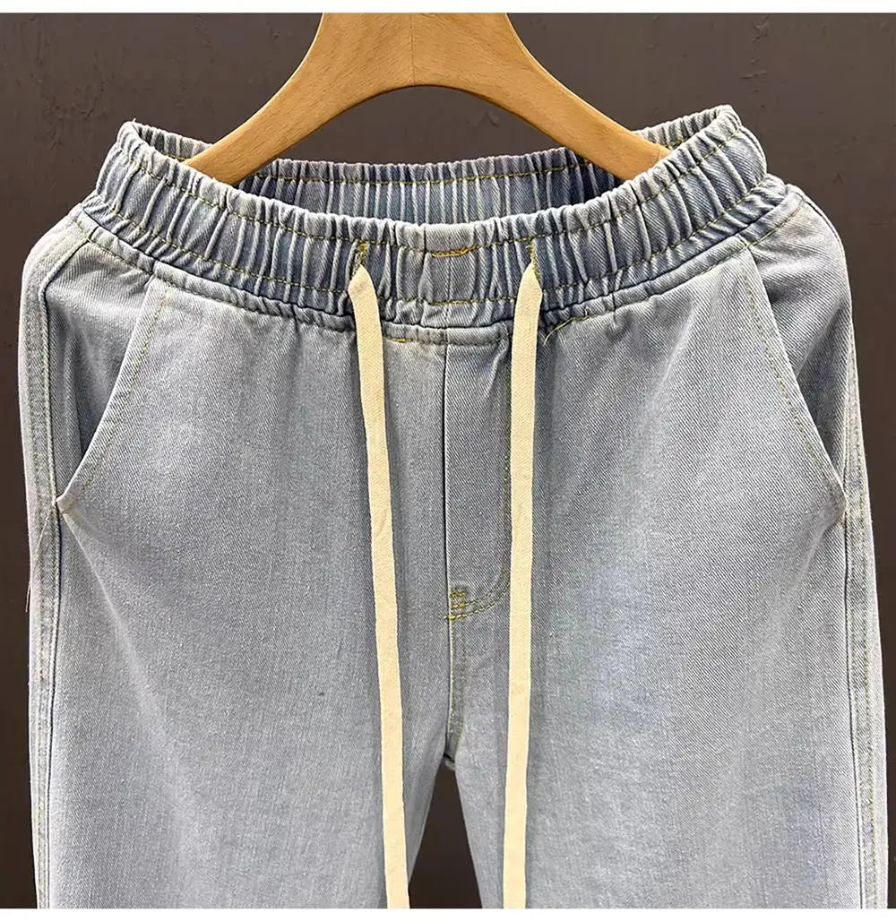 Men's vintage loose straight leg jeans by TrendLux Wear made of durable cotton denim, perfect for casual spring and autumn wear.