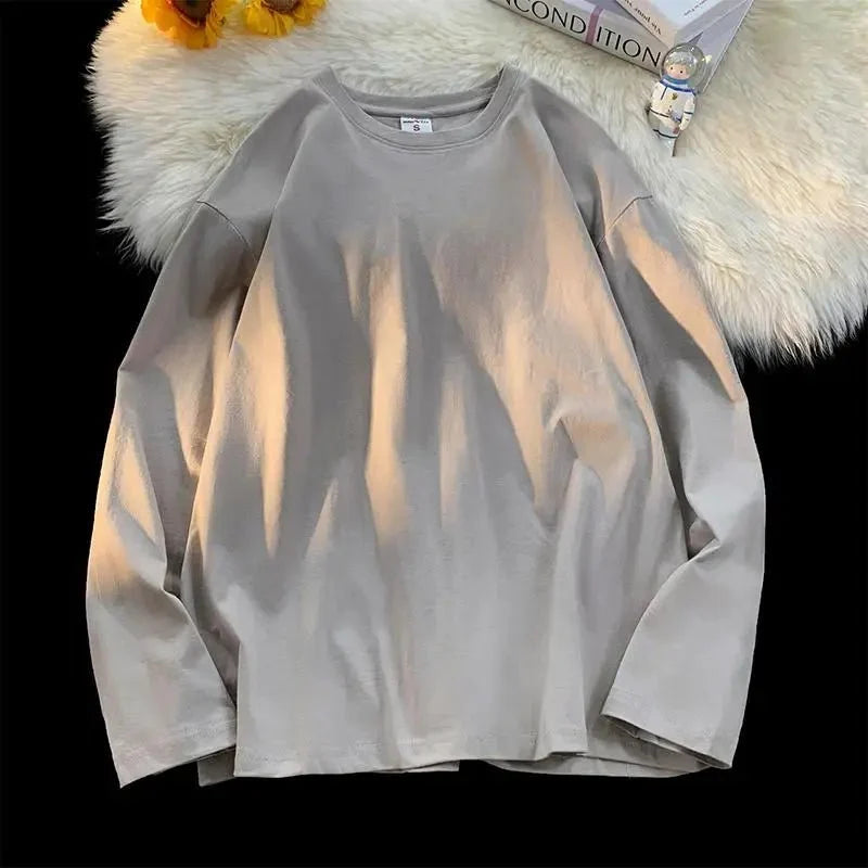 Unisex oversized long sleeve blank T-shirt from My Store 5, available in 18 colors and sizes S to 3XL, laid flat.