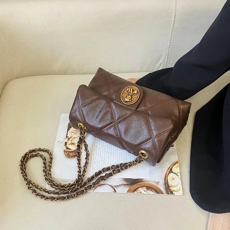 Women's luxury TrendLux Wear leather handbag with Lingge pattern, featuring a sleek designer design and elegant craftsmanship.