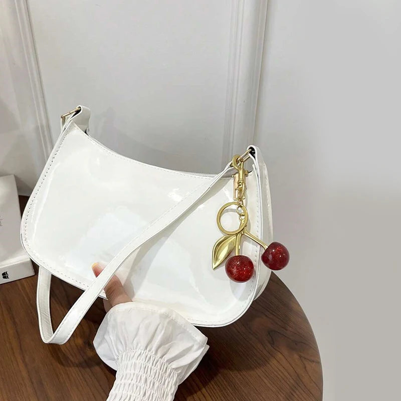 TrenLux Wear Women's Pure Leather Solid Colour Cherry Pendant  Bag TrenLux Wear