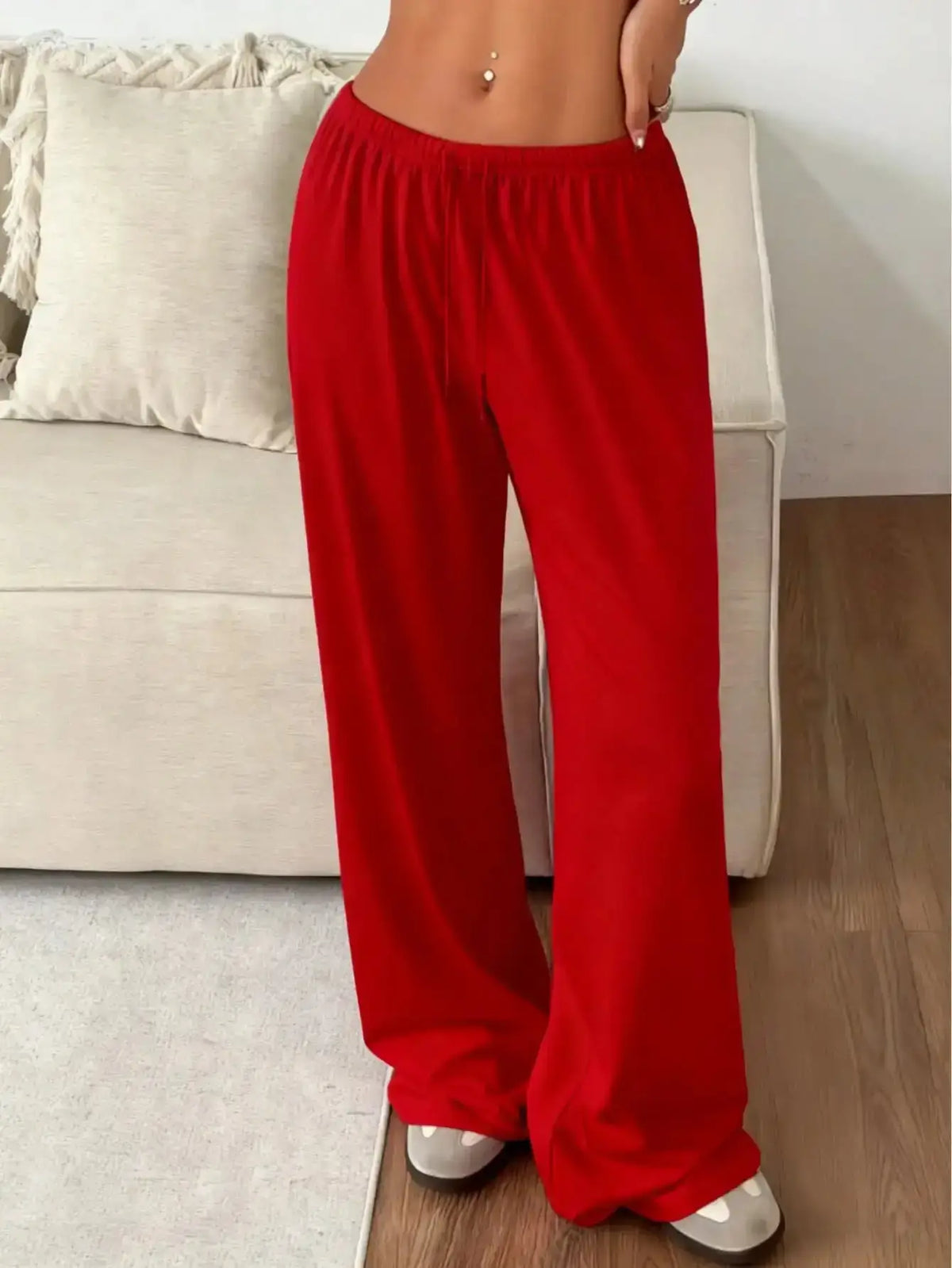 Ladies' casual wide-leg jogging pants by TrendLux Wear, shown in a relaxed fit with comfortable fabric and stylish design.