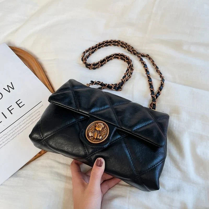 Women's luxury leather handbag with Lingge pattern from TrendLux Wear, showcasing elegant design and premium pure leather material.