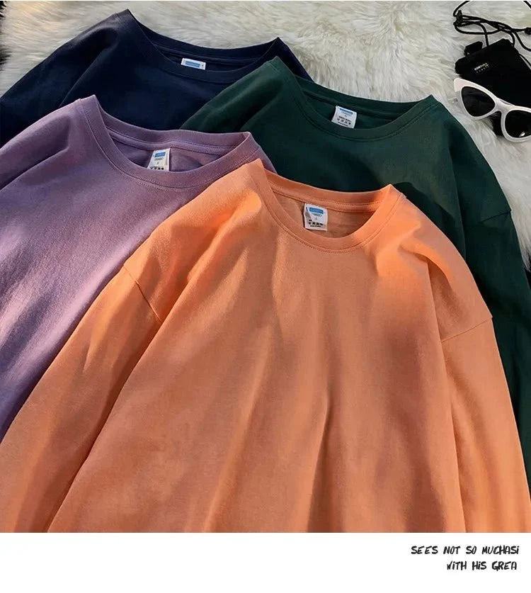 Unisex oversized long sleeve blank T-shirt by My Store 5, shown in a relaxed fit with long sleeves, available in multiple colors.