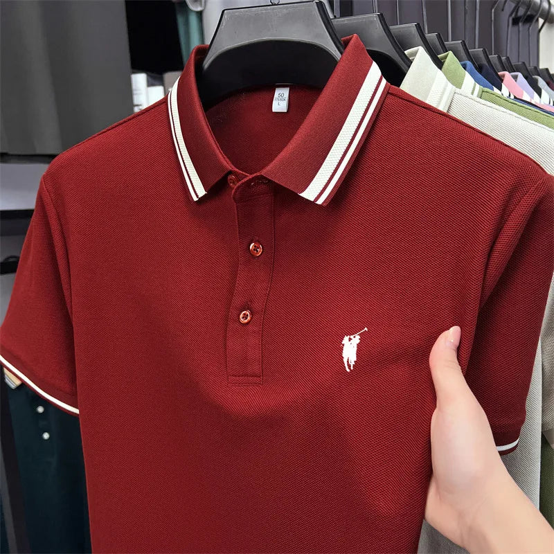 Short sleeve polo shirt in dark red with white striped collar and pony embroidery. Made of breathable cotton.