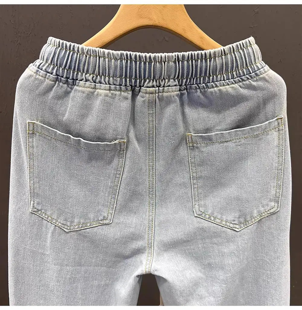 Men's vintage loose straight-leg jeans by TrendLux Wear in durable cotton denim, perfect for casual spring and autumn wear.