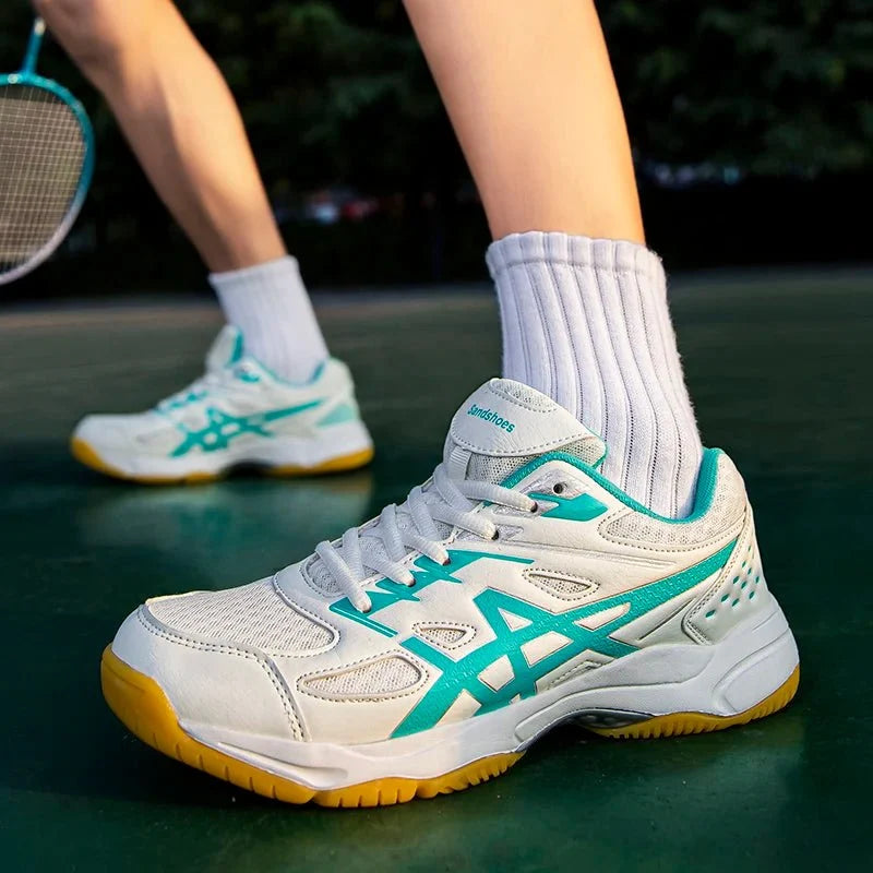 Unisex TrendLux Wear anti-slip court sneakers for badminton and table tennis, featuring breathable athletic shoe design.