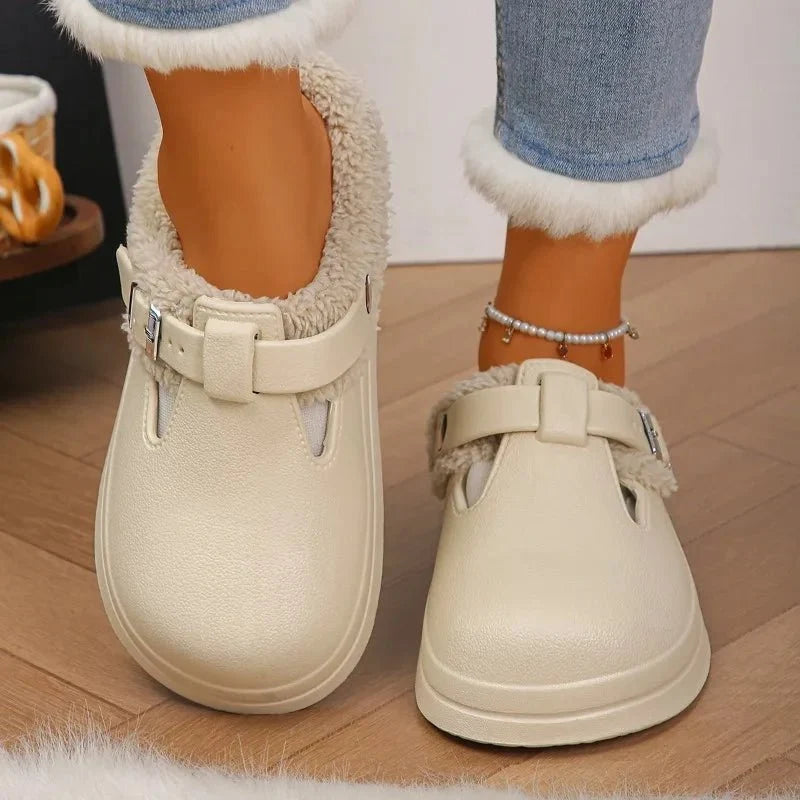 Women's waterproof furry mule slippers by TrendLux Wear featuring plush interior, EVA sole, non-slip design, and metal buckle.