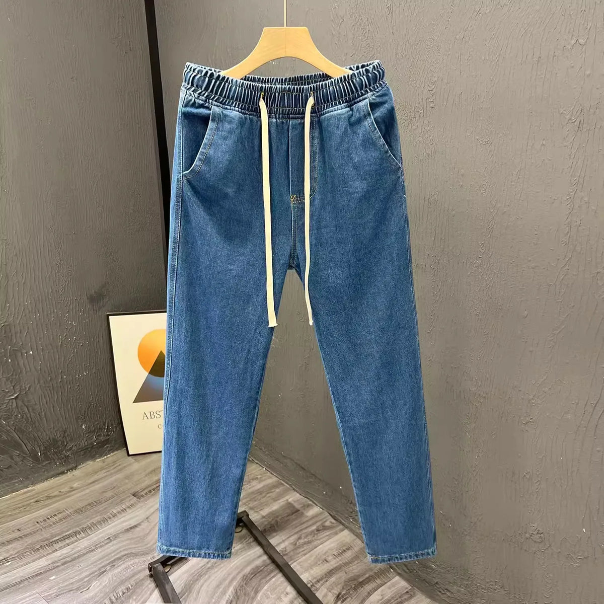 Men's vintage loose straight-leg jeans by TrendLux Wear made of durable cotton denim, perfect for casual spring and autumn wear.