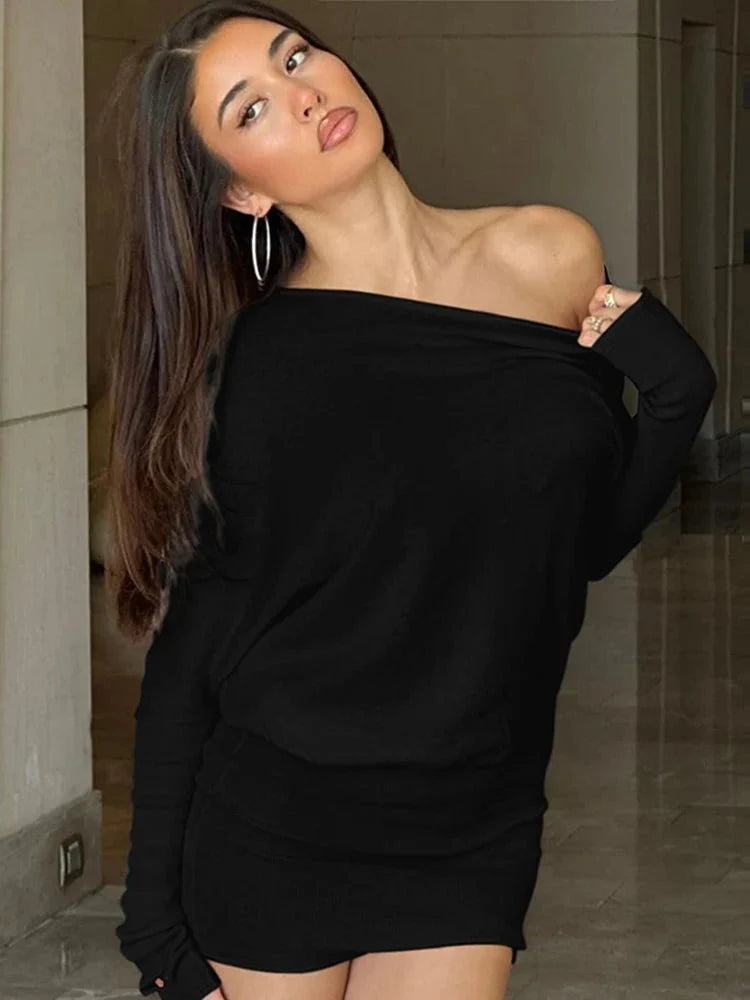 Women's off-shoulder bodycon mini dress by TrendLux Wear featuring long sleeves and oblique neck, ideal for fall and winter parties.