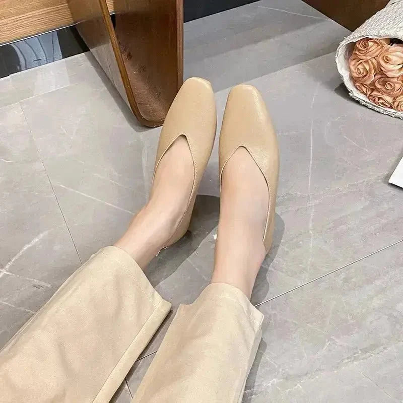 Women's round-toe leather loafer flats by TrendLux Wear, featuring sleek design and comfortable slip-on style.