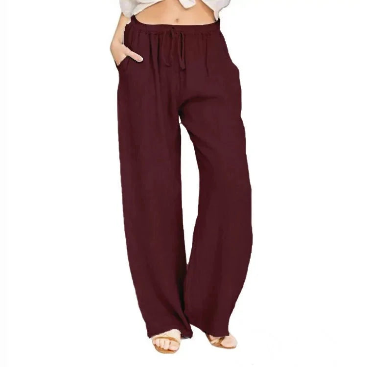 Women's linen cotton casual trousers with elastic waist and wide-leg fit by TrendLux Wear, showing relaxed and comfortable pants.