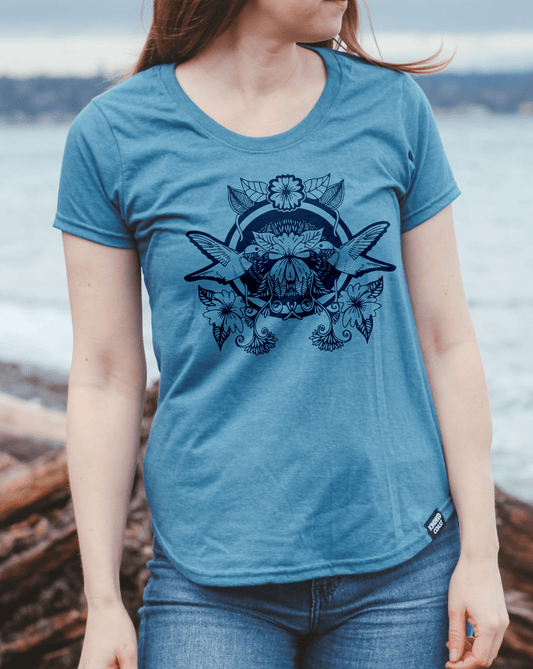 Women's eco-friendly teal T-shirt with hummingbird graphic by KINDRED COAST, casual fit and soft fabric.
